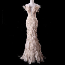 Load image into Gallery viewer, True Couture Plugging V neckline  Floor Length  Feather Champagne Evening Gown